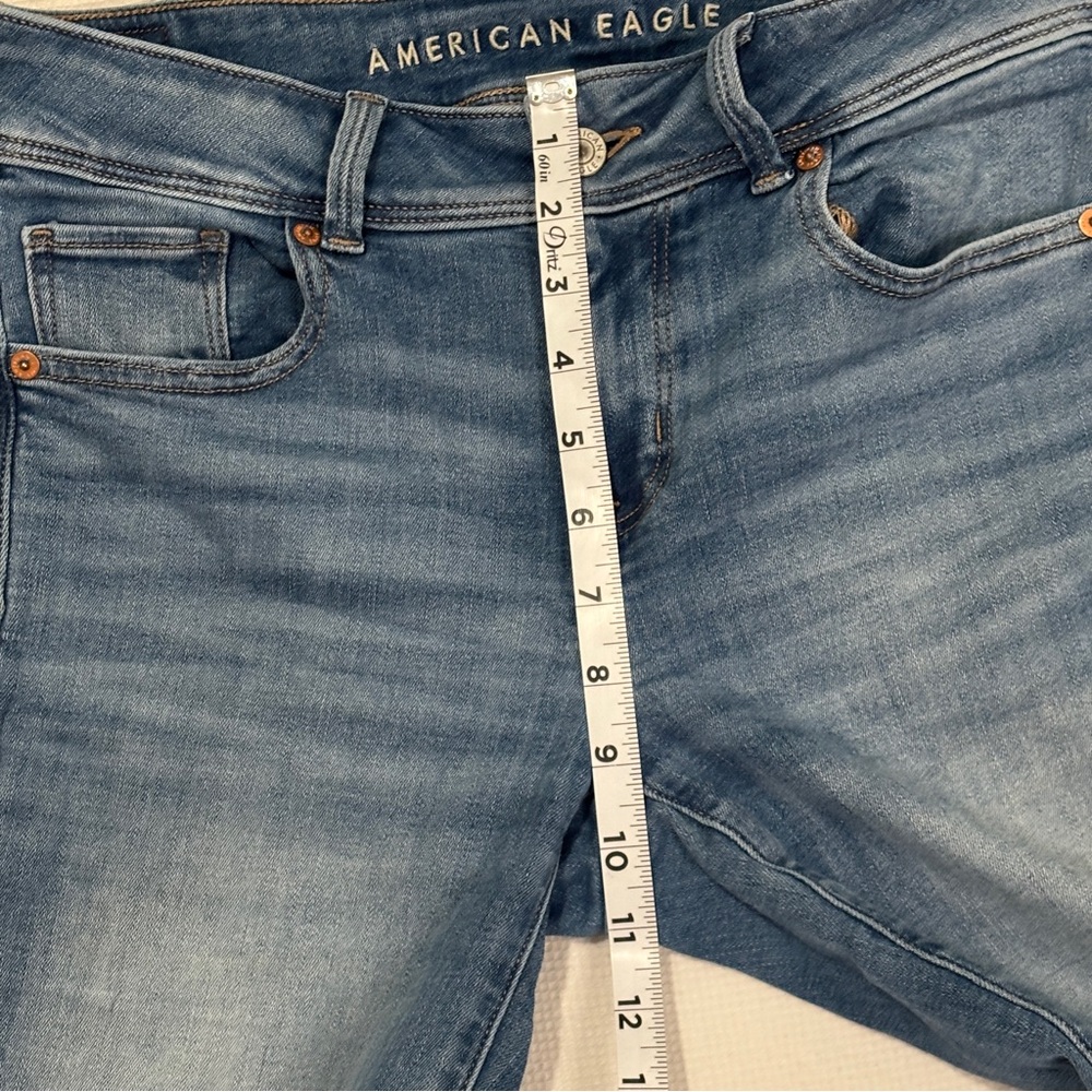 American Eagle Next Level Stretch High Rise Kick Boot Jeans in Light Wash Denim - Picture 9 of 12